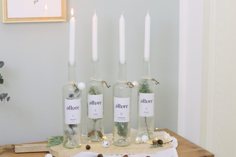 DIY selbstgemachter Upcycling Adventskranz aus Weinflaschen mit Tanne