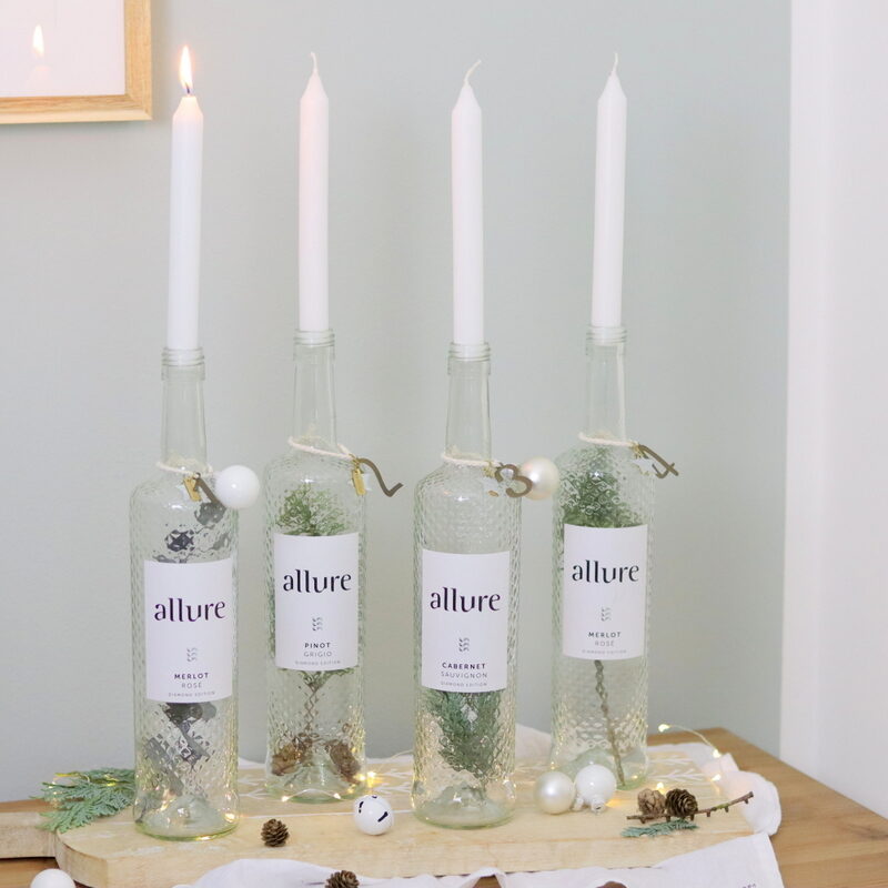 DIY selbstgemachter Upcycling Adventskranz aus Weinflaschen mit Tanne